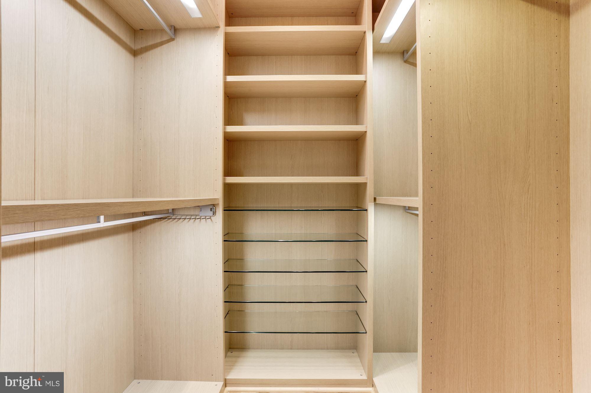 1700 Kalorama Road Northwest, Unit 312 Washington, DC 20009 - Photo 20 of 45 a view of walk in closet with empty racks