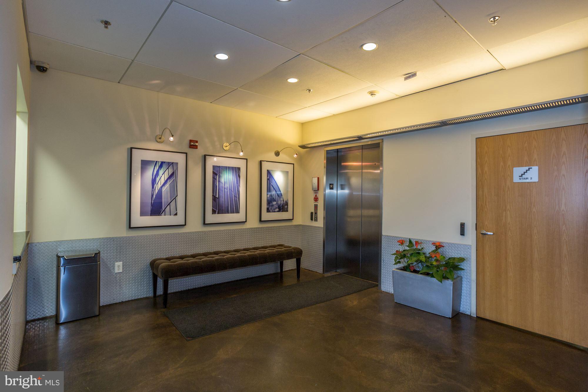 1700 Kalorama Road Northwest, Unit 312 Washington, DC 20009 - Photo 30 of 45 a view of hall way with furniture