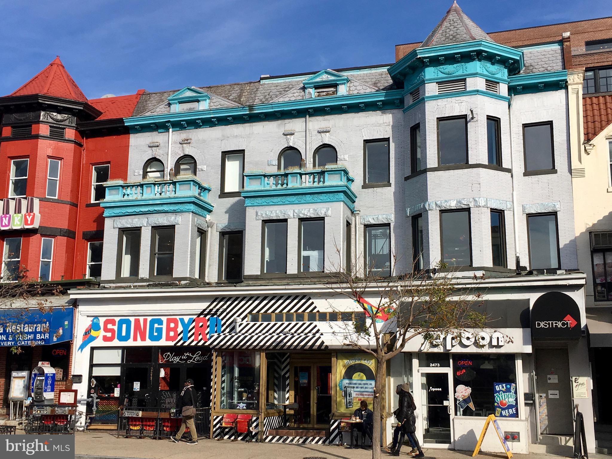 1700 Kalorama Road Northwest, Unit 312 Washington, DC 20009 - Photo 38 of 45 a view of a food market with retail stalls