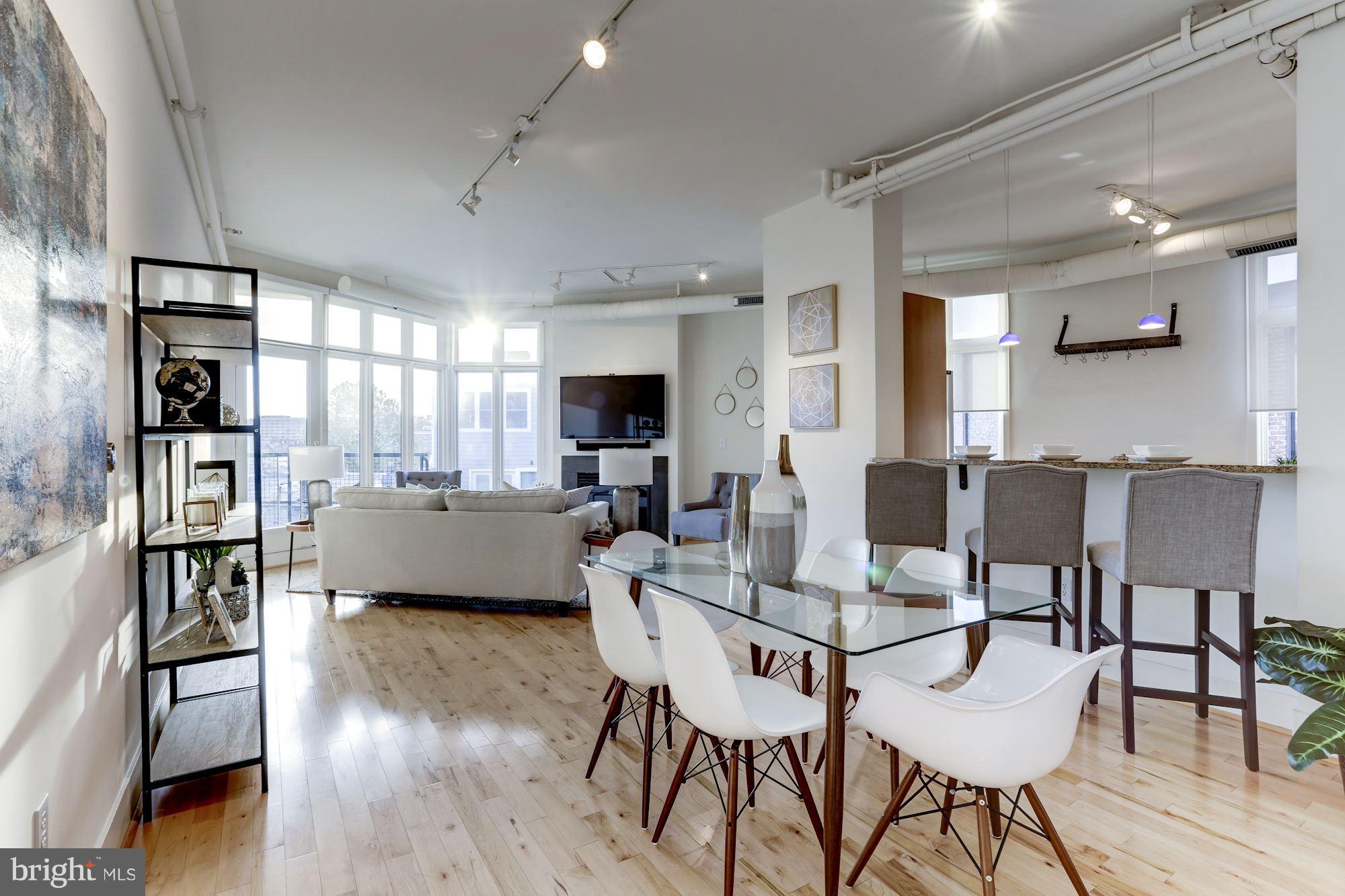 1700 Kalorama Road Northwest, Unit 312 Washington, DC 20009 - Photo 45 of 45 a view of a dining room with furniture and wooden floor
