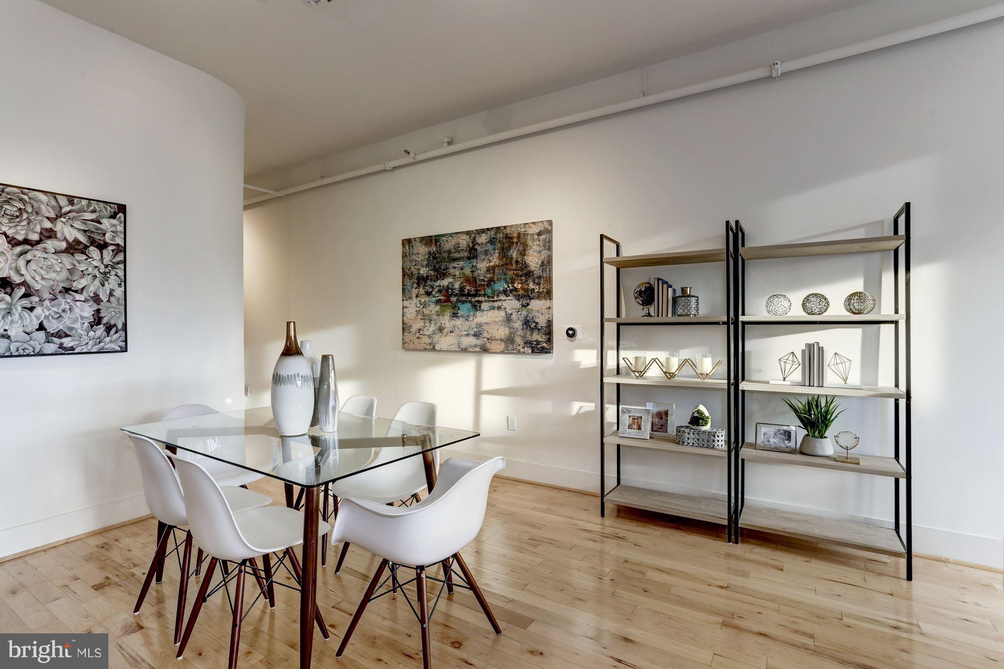 1700 Kalorama Road Northwest, Unit 312 Washington, DC 20009 - Photo 7 of 45 a view of a dining room with furniture and wooden floor