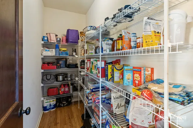 a living room with furniture window and a fireplace
