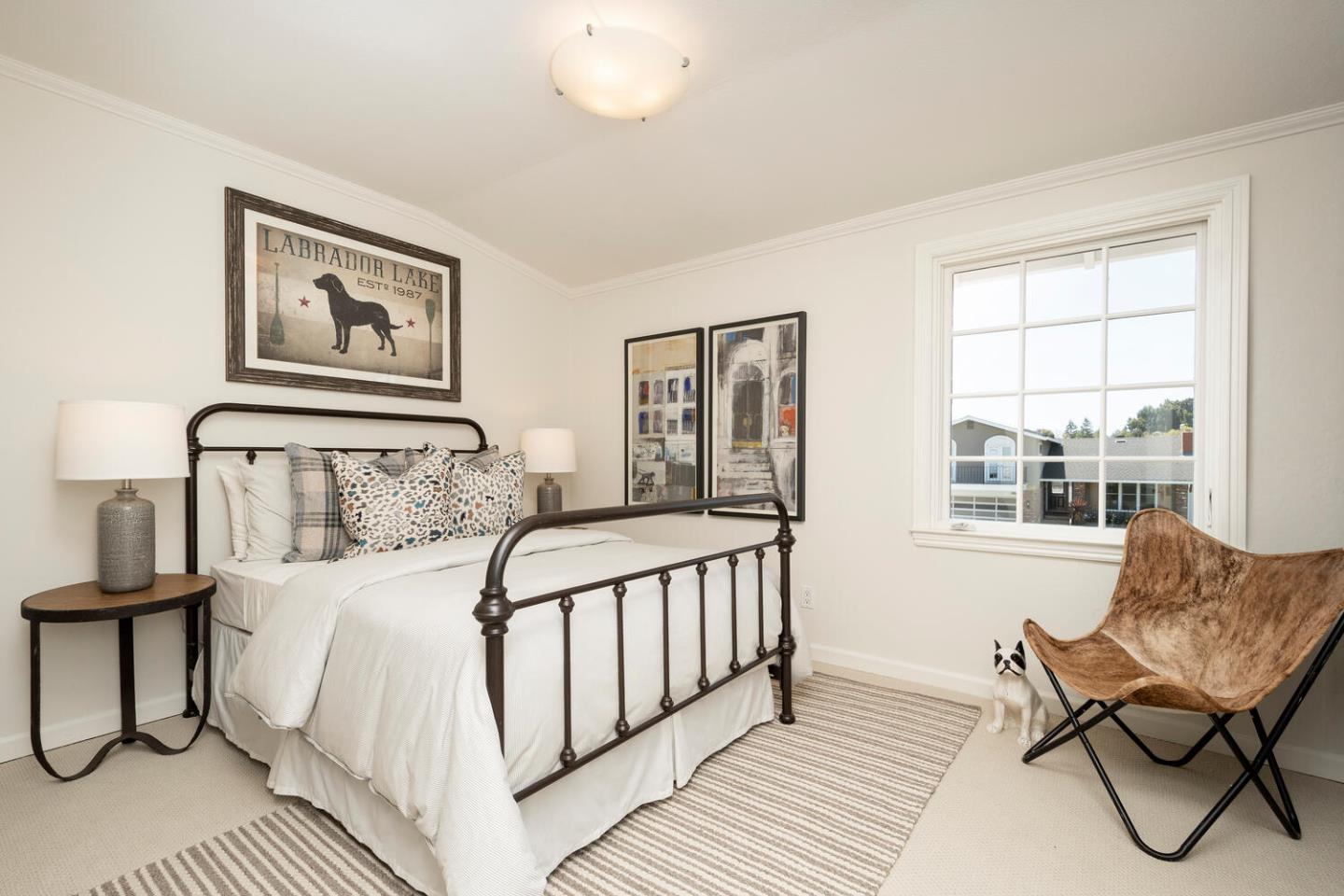 1094 Springfield Drive Millbrae, CA 94030 - Photo 24 of 36 a bedroom with a bed and wooden floor