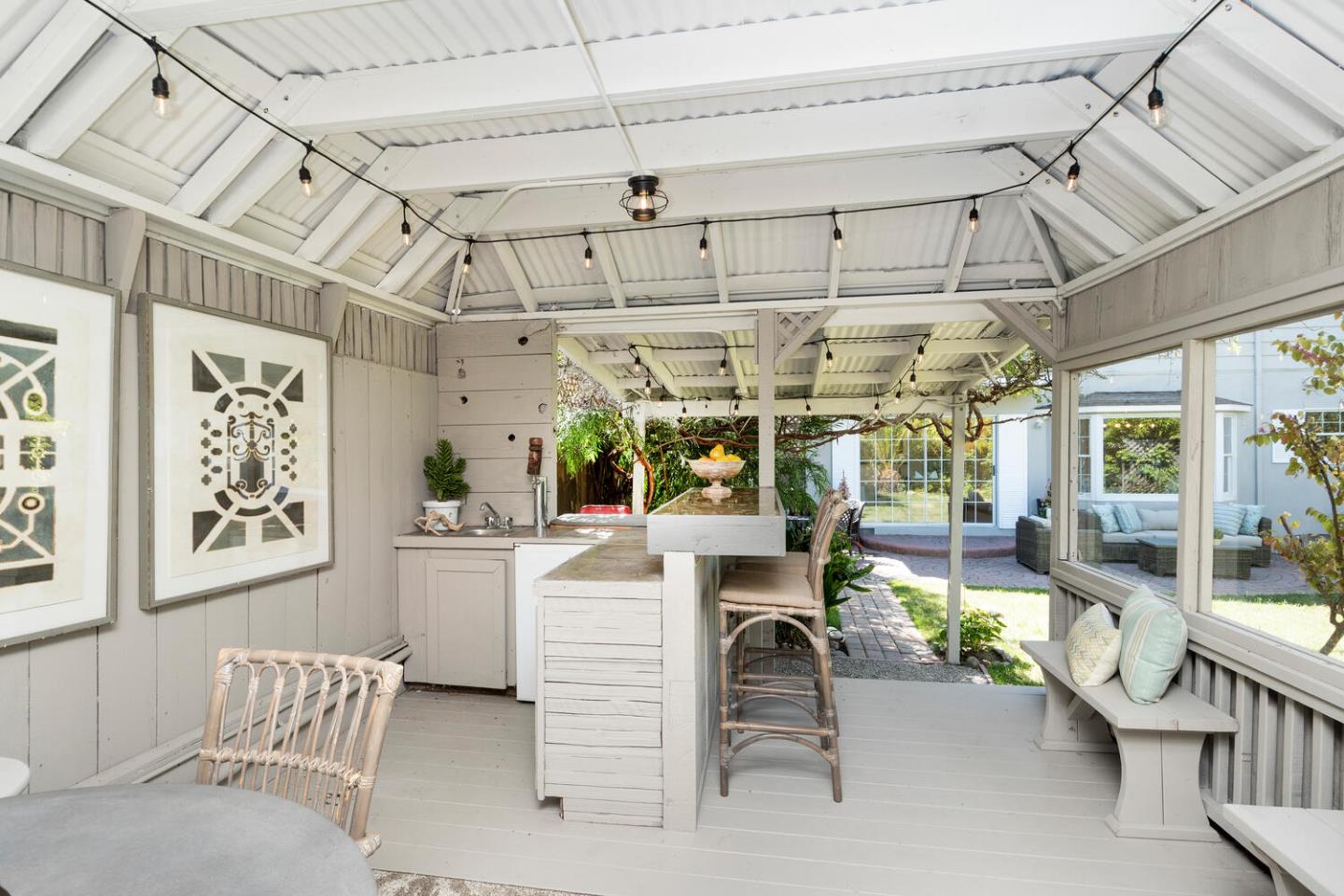 1094 Springfield Drive Millbrae, CA 94030 - Photo 32 of 36 a view of a dining room with furniture a chandelier and a rug