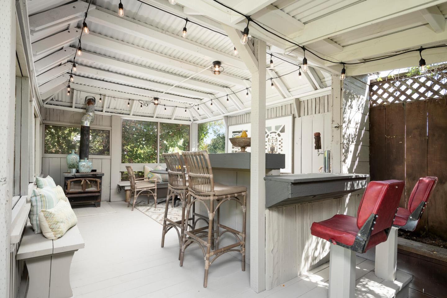 1094 Springfield Drive Millbrae, CA 94030 - Photo 33 of 36 a living room with furniture and a floor to ceiling window