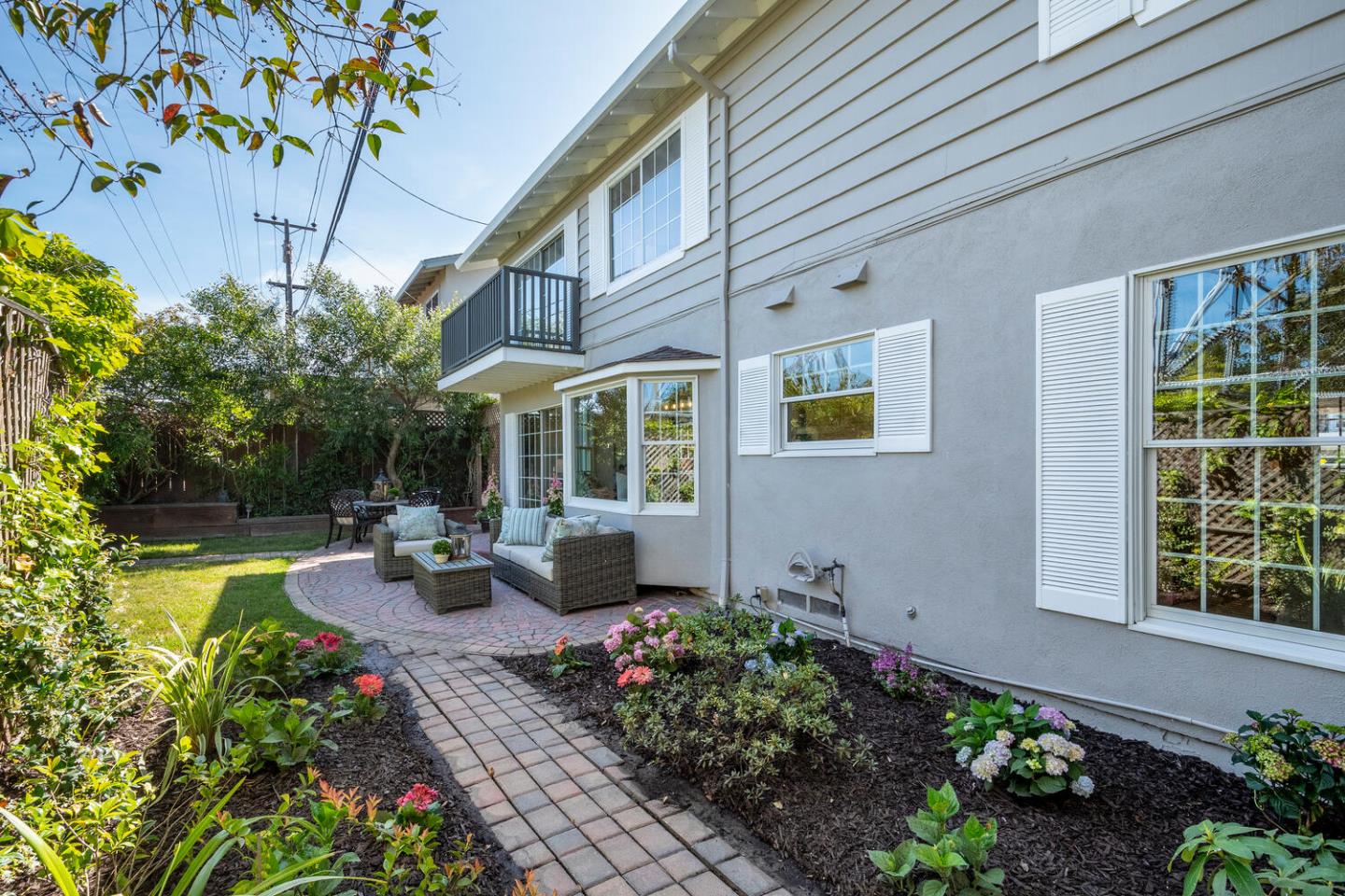 1094 Springfield Drive Millbrae, CA 94030 - Photo 34 of 36 a view of a house with backyard sitting area and garden