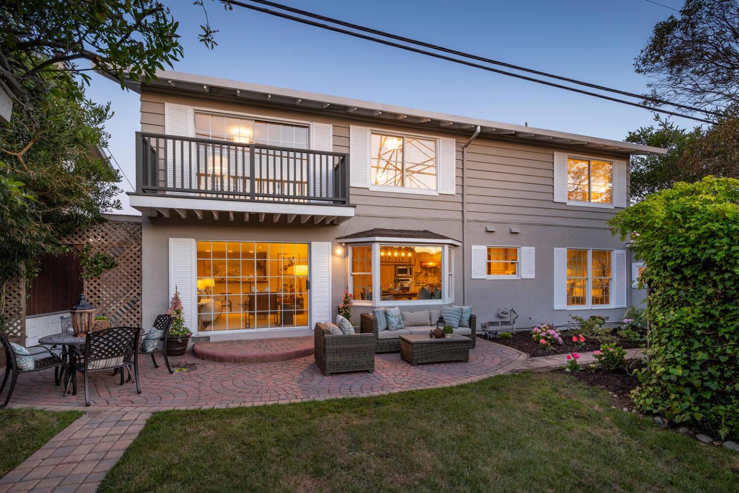 1094 Springfield Drive Millbrae, CA 94030 - Photo 35 of 36 a patio with couches table and chairs and potted plants