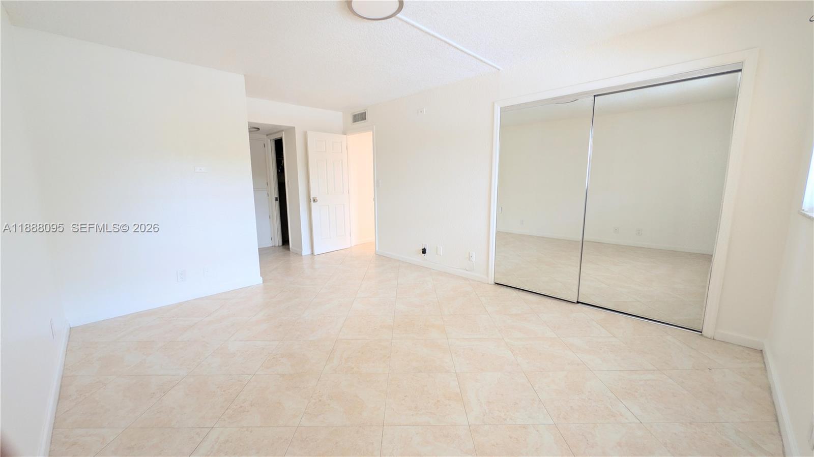3090 North Course Drive, Unit 304 Pompano Beach, FL 33069 - Photo 13 of 13 a view of an empty room