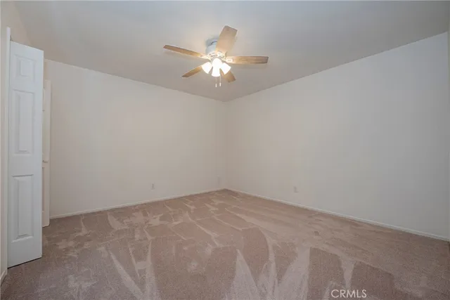 a bathroom with a double vanity sink mirror and shower