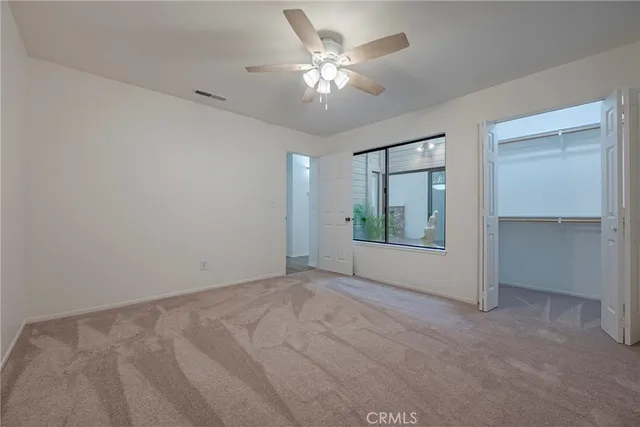 a view of a backyard with sitting area