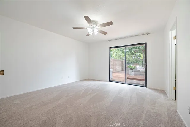 swimming pool view with a seating space