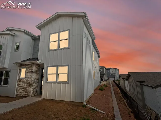 a view of a house with many windows