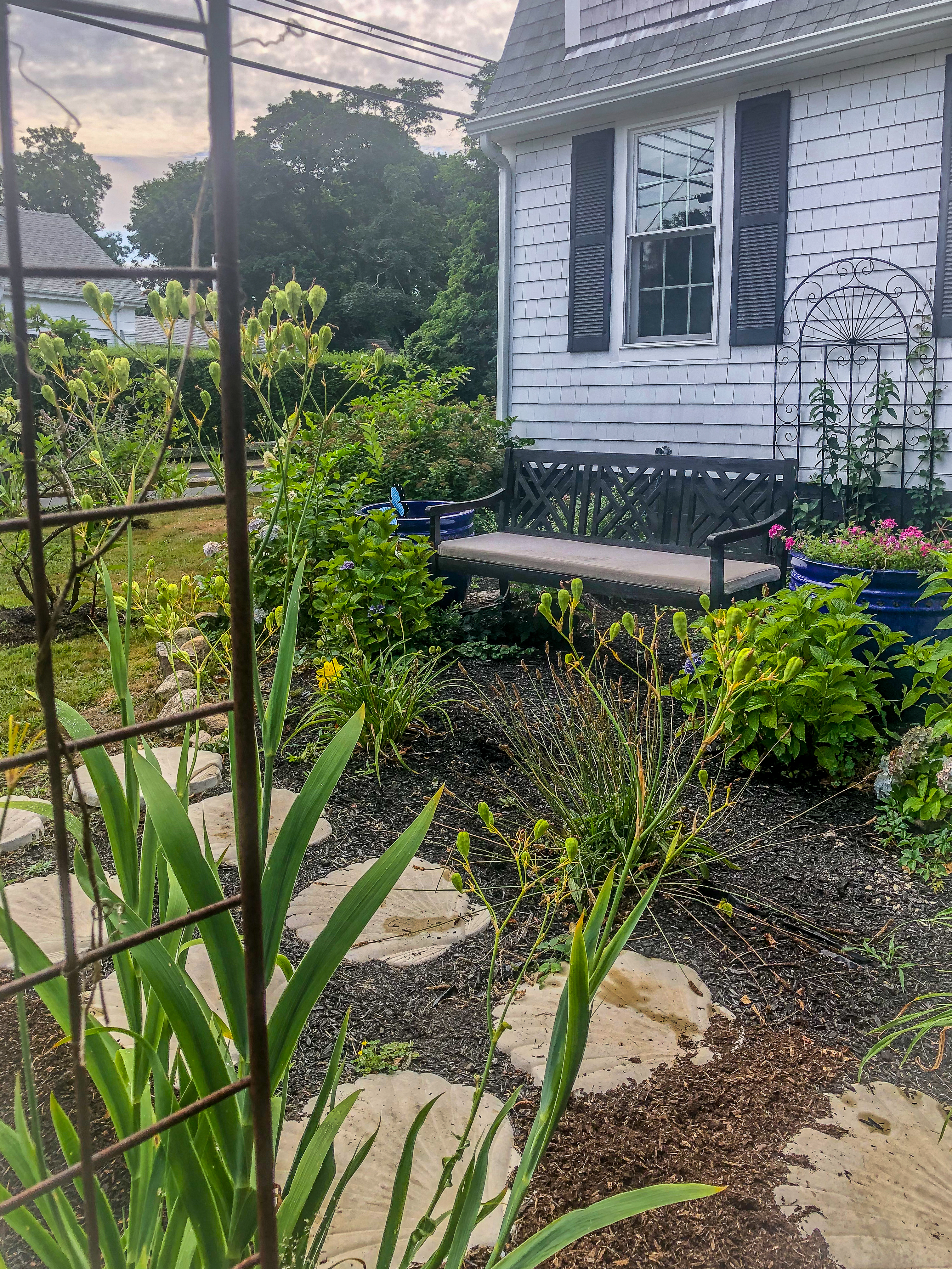 112 Spring Street Vineyard Haven, MA 02568 - Photo 23 of 25 a front view of a house with a yard