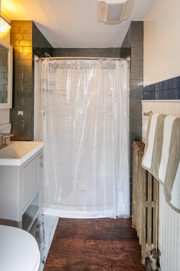 112 Spring Street Vineyard Haven, MA 02568 - Photo 4 of 25 a bathroom with a sink and a mirror