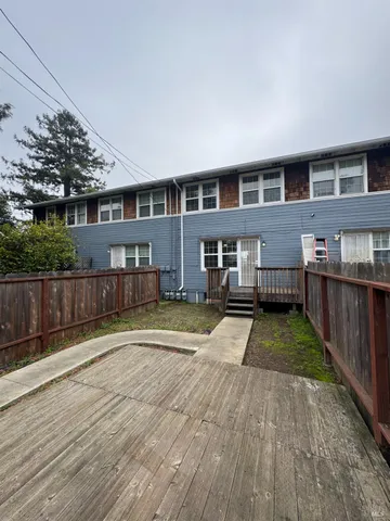 a view of house with a swimming pool