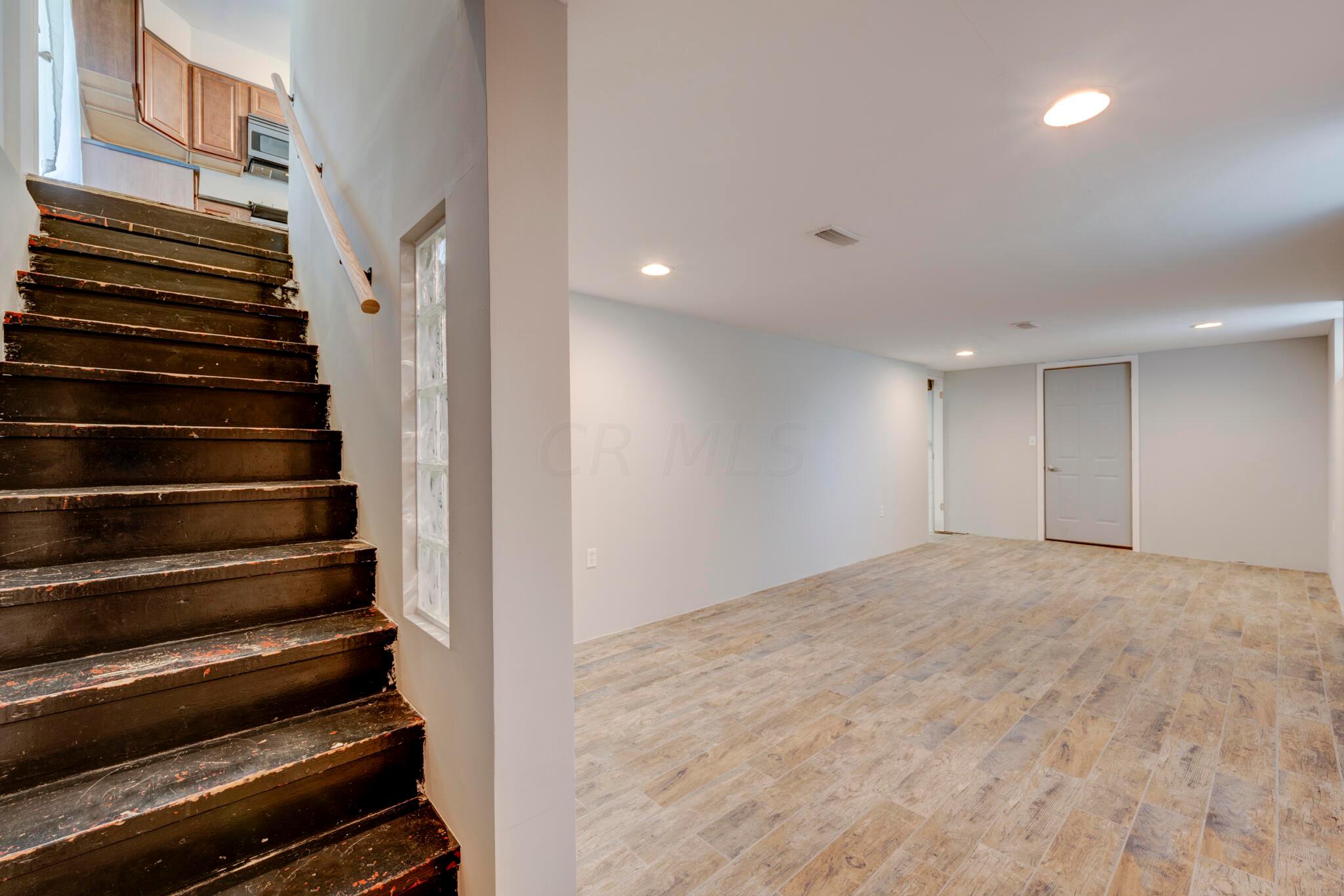 3225 Cross Keys Road Columbus, OH 43232 - Photo 28 of 41 Lower level rec room with ceramic floor, recessed lighting