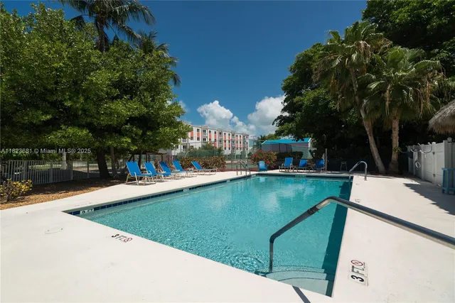 a view of hallway with furniture