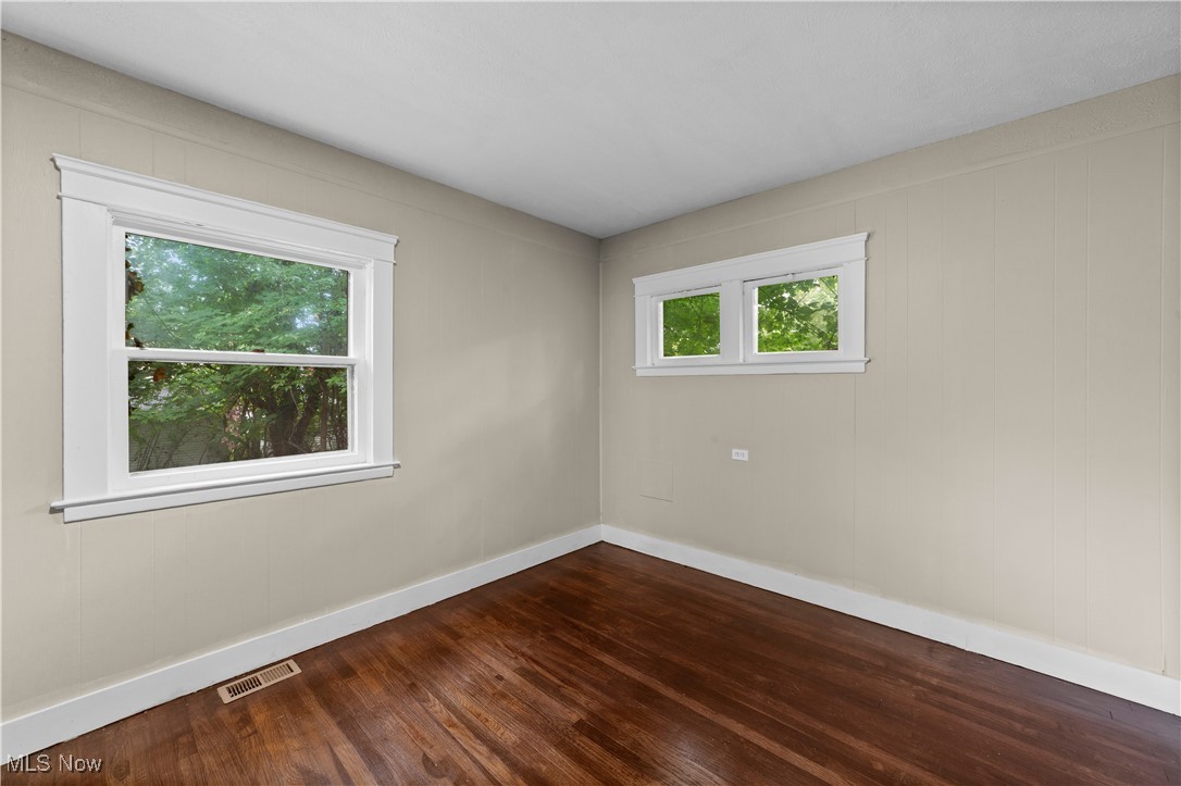 3165 Oak Road Cleveland, OH 44118 - Photo 17 of 30 Empty room featuring dark wood-type flooring and baseboards