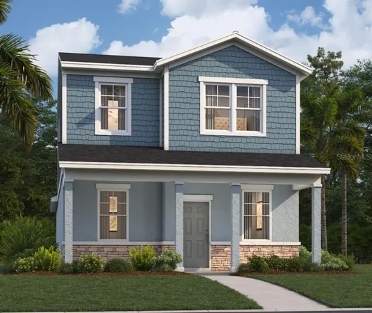 front view of brick house with a yard