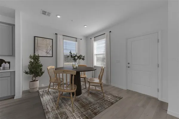 a view of a dining room with furniture