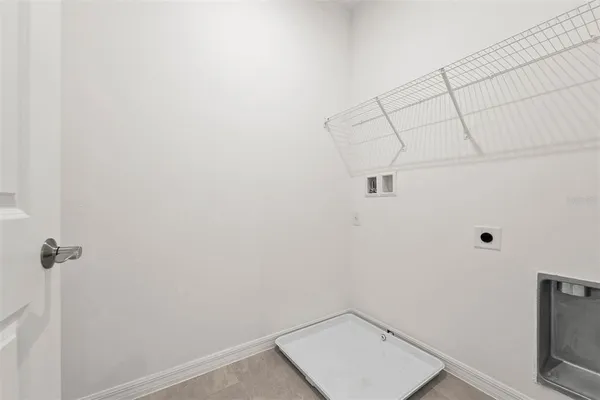 a view of a room with racks on the wall