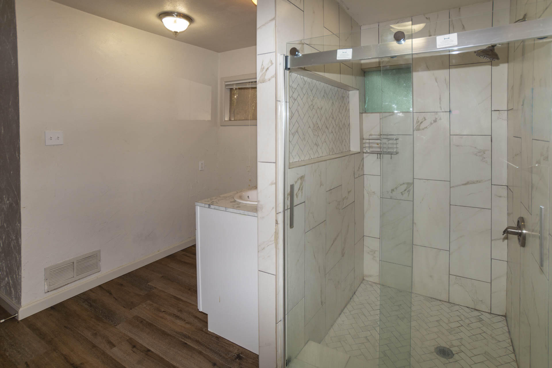 2136 57th Street Lubbock, TX 79412 - Photo 19 of 41 a bathroom with a shower