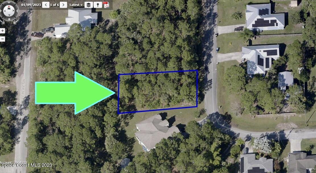 1266 Landau Road Southwest Palm Bay, FL 32908 - Photo 3 of 4 an aerial view of a tennis court