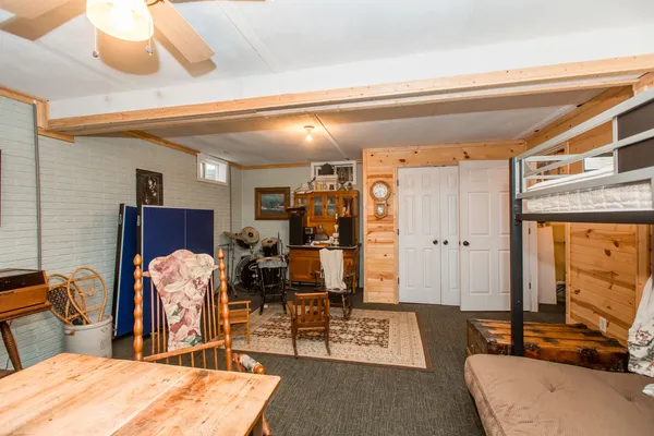a room with furniture and a mirror