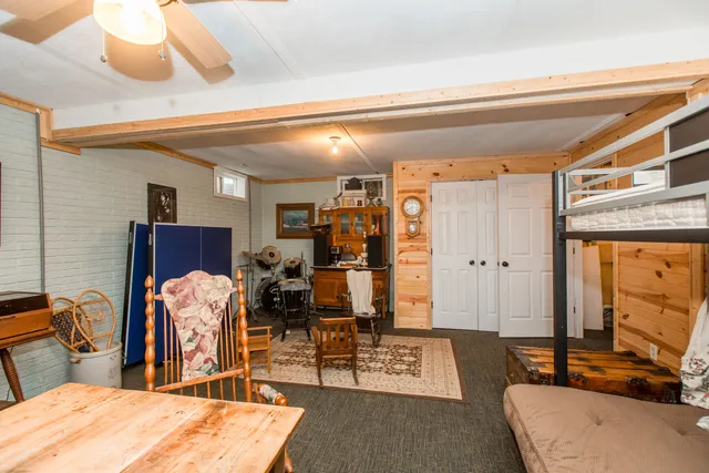 a room with furniture and a mirror