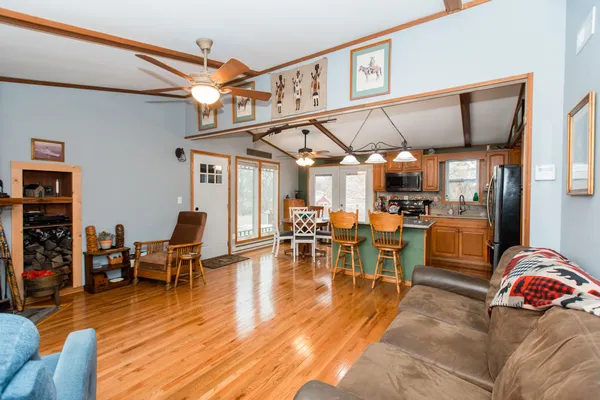 a view of a living room and dining room