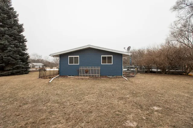 a backyard of a house with lots of green space