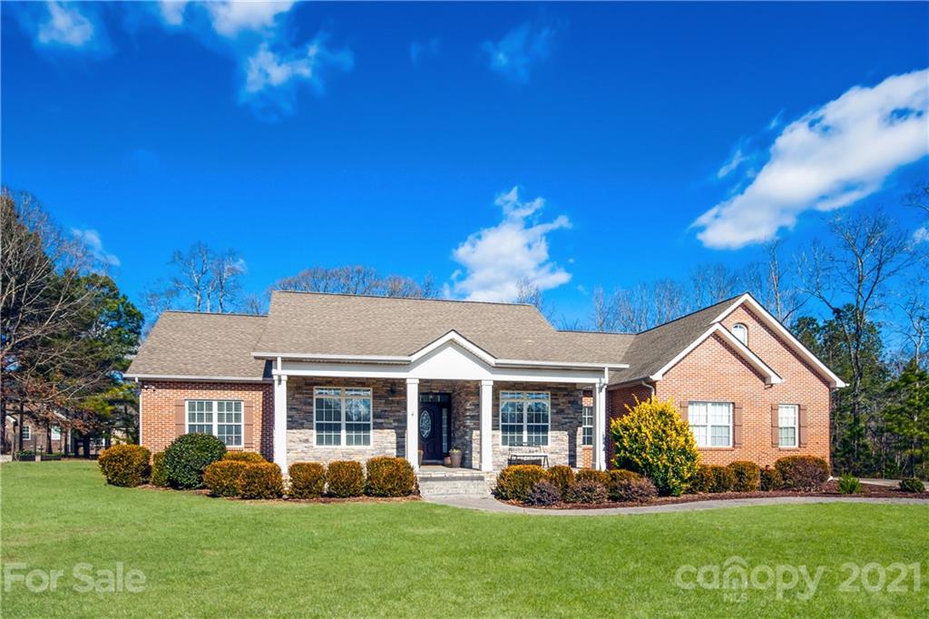 3334 Millstone Creek Road Lancaster, SC 29720 - Photo 1 of 17 a front view of a house with a yard