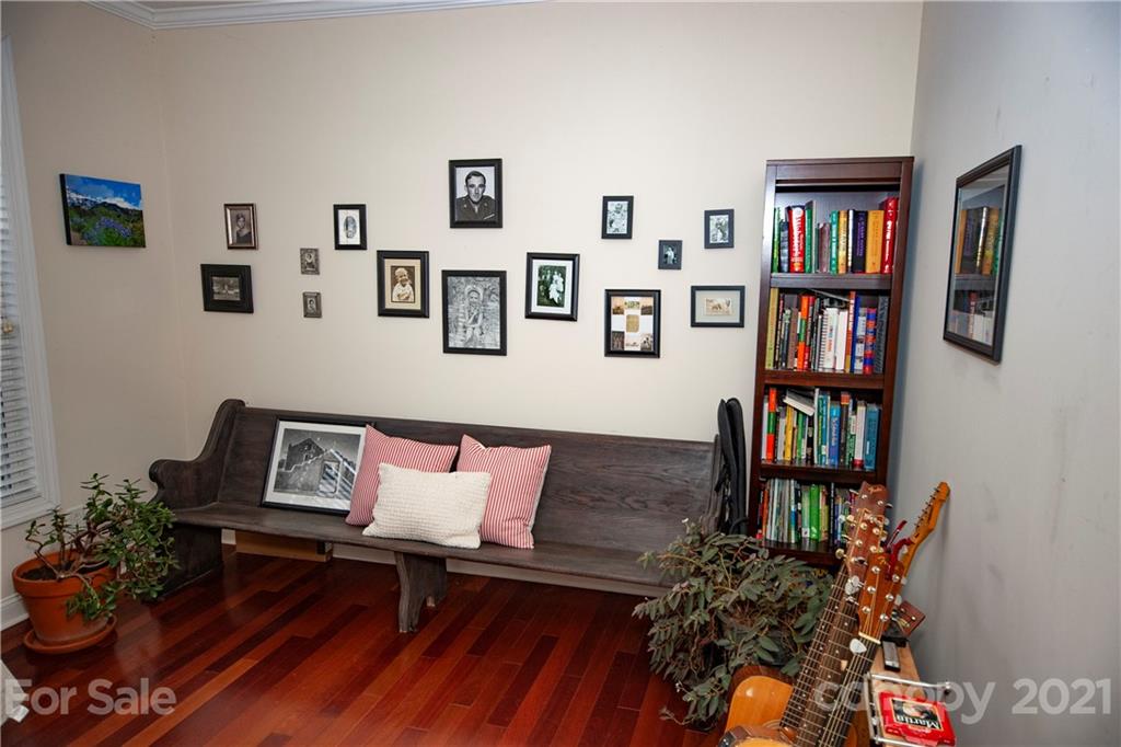 3334 Millstone Creek Road Lancaster, SC 29720 - Photo 11 of 17 a living room with furniture and book shelf