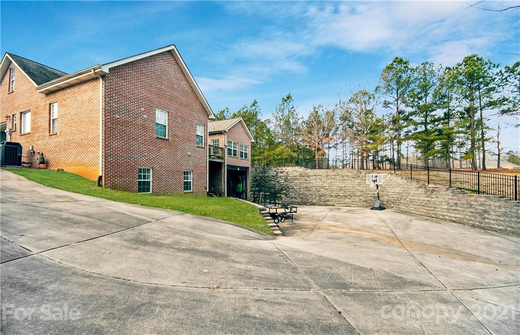 3334 Millstone Creek Road Lancaster, SC 29720 - Photo 16 of 17 a view of a house with a yard and road