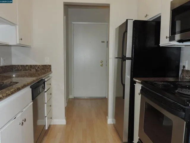 a bathroom with a double vanity sink and mirror