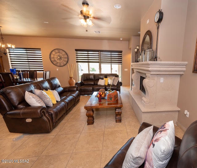 407 Camino Agua Fria Rio Rico, AZ 85648 - Photo 10 of 41 a living room with furniture