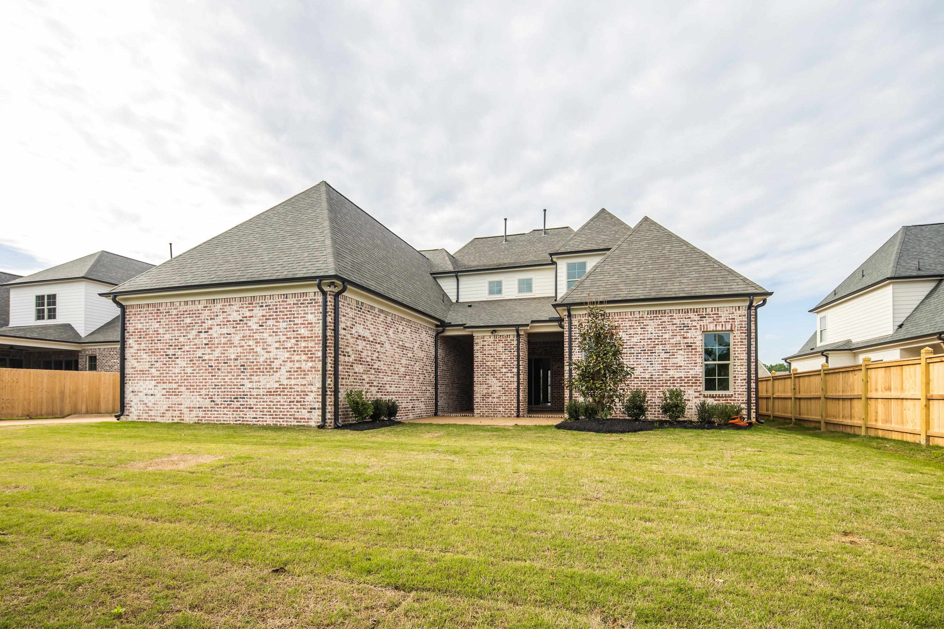 284 Keisie Lane Collierville, TN 38017 - Photo 12 of 34 Two-story residence featuring a varied brick facade and a dark shingle roof