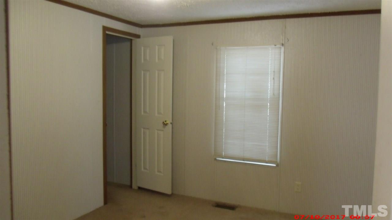 1129 Taos Trail Raleigh, NC 27603 - Photo 8 of 10 a view of an empty room