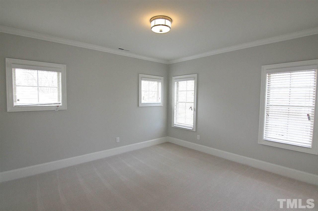 4011 Edwards Mill Road Raleigh, NC 27612 - Photo 23 of 25 an empty room with a window