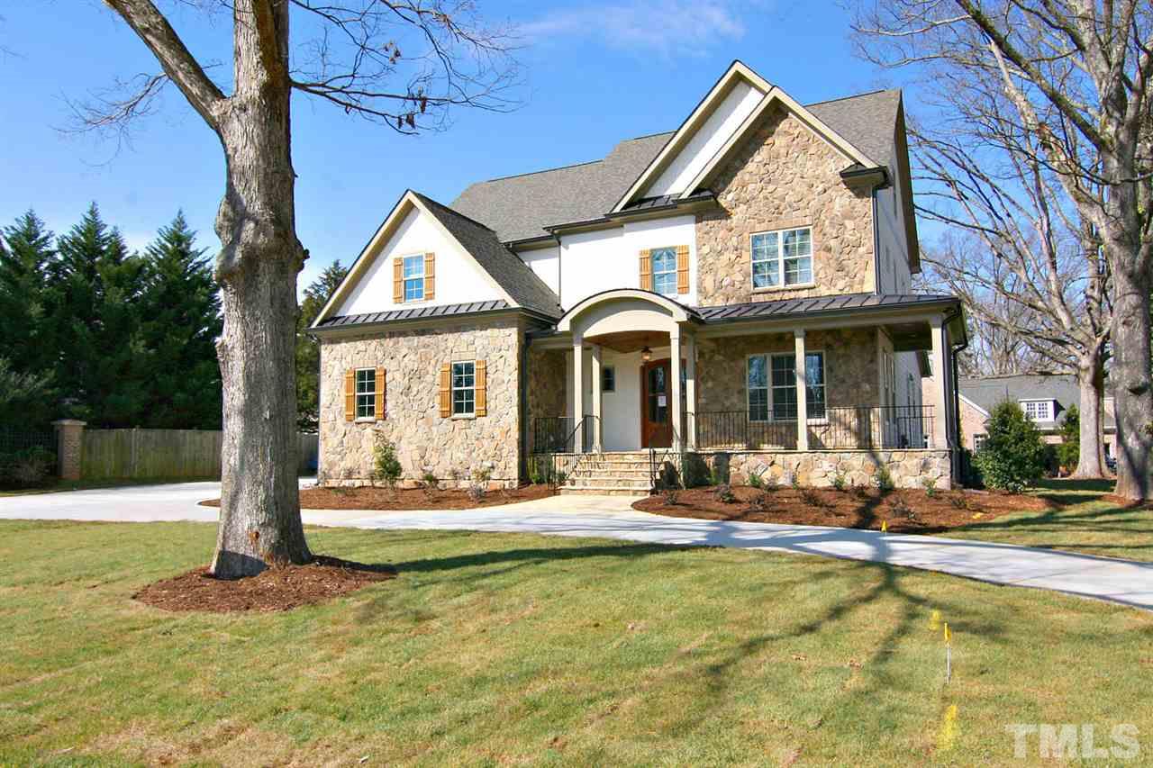 4011 Edwards Mill Road Raleigh, NC 27612 - Photo 5 of 25 a view of a house with backyard porch and sitting area