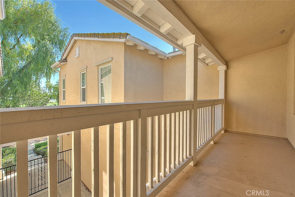 8150 West Preserve Loop Chino, CA 91708 - Photo 12 of 51 a view of a small yard from a balcony