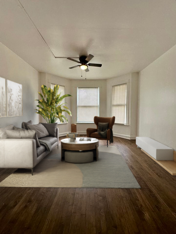10749 South State Street Chicago, IL 60628 - Photo 5 of 31 a living room with furniture and a large window