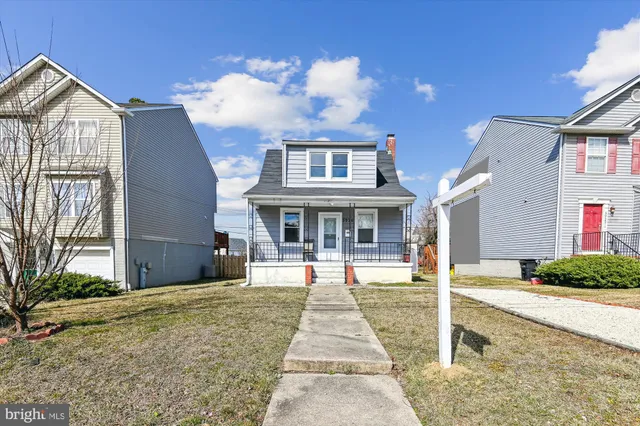 a front view of house with a yard