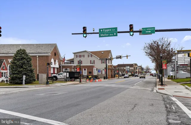 a front view of a building with a street