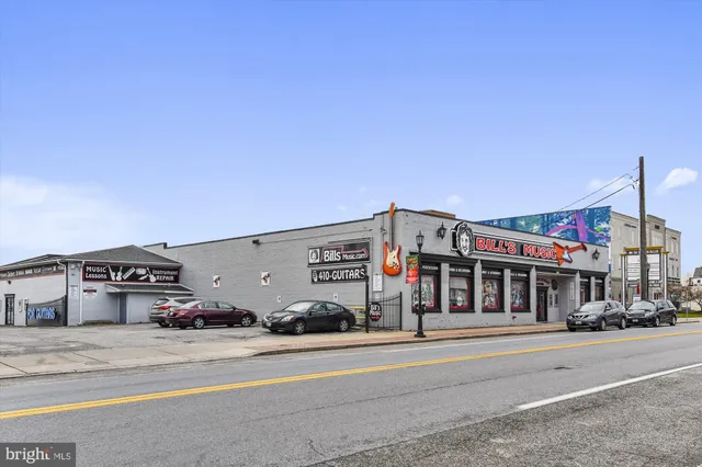 a view of a food mall next to a road