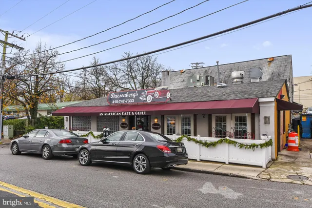 a view of cars parked in front of a building