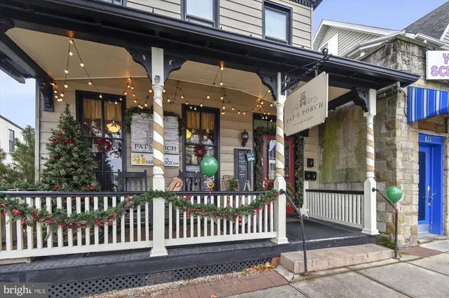 a view of a chair and table of the house