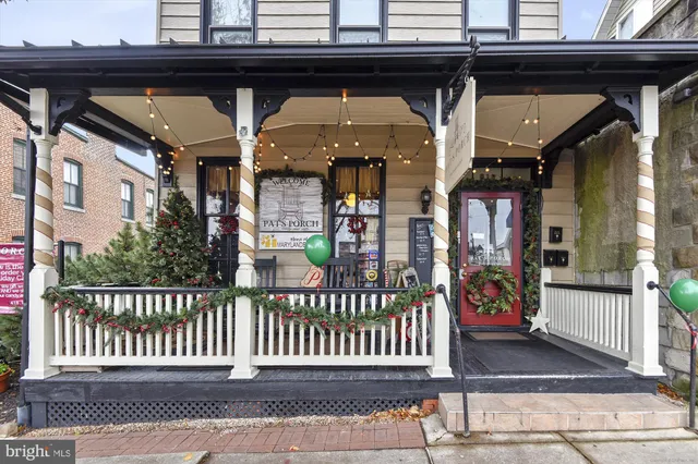 a front view of a house with a garage