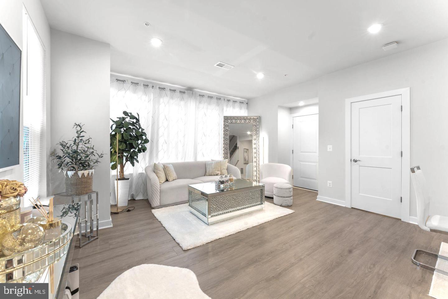 43785 Transit Square Ashburn, VA 20147 - Photo 1 of 40 a living room with furniture and a large window