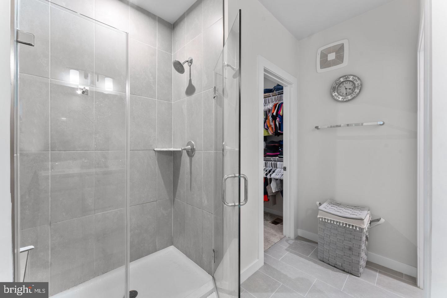 43785 Transit Square Ashburn, VA 20147 - Photo 16 of 40 a bathroom with a shower